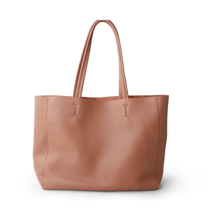 Czarna shopperka ze skóry naturalnej, elegancka i przestronna, dodatek dla nowoczesnej kobiety.