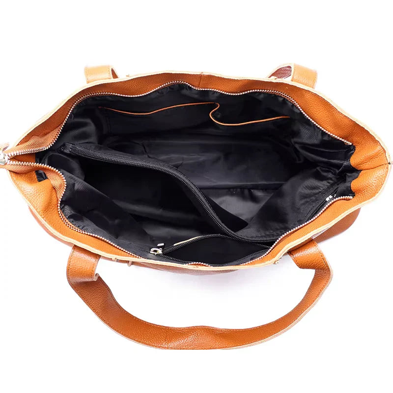 Duża shopperka ze skóry, kolor camel, z zamkiem, idealna dla nowoczesnej i eleganckiej kobiety.