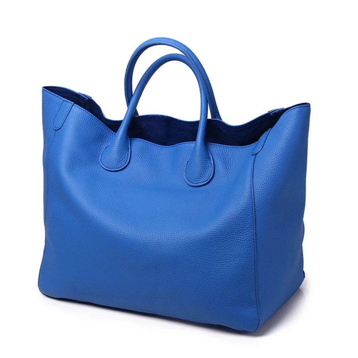 Torebka shopper bag ze skóry naturalnej, duża, w kolorze niebieskim, przestronna i elegancka dla kobiet, idealna na co dzień.
