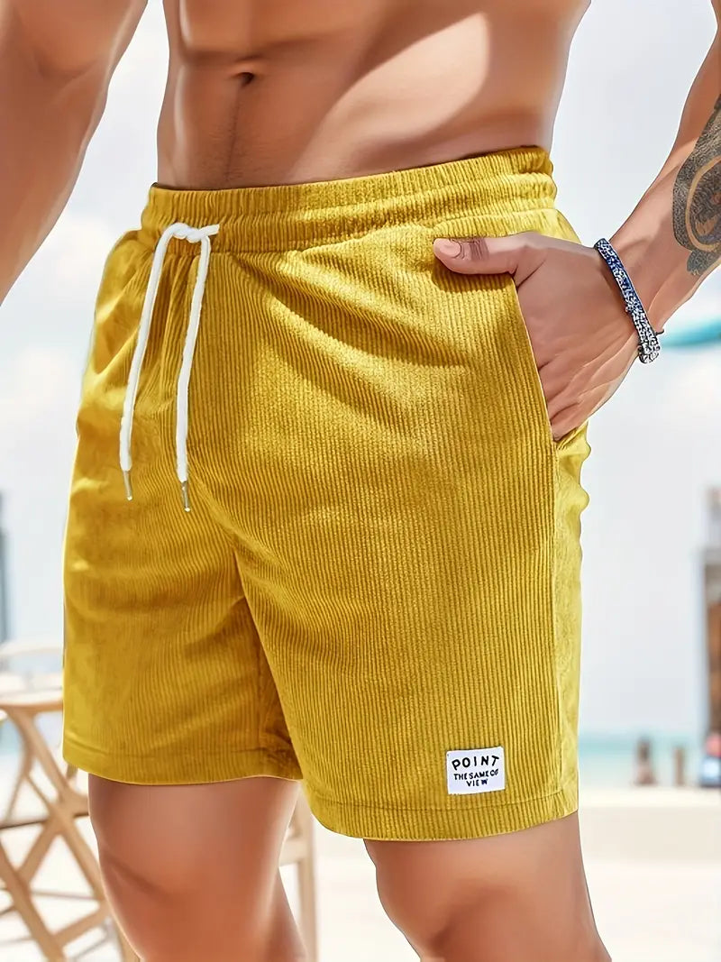 Short de bain homme coloré avec taille élastique et cordon, parfait pour la plage ou piscine, séchage rapide et élégant.