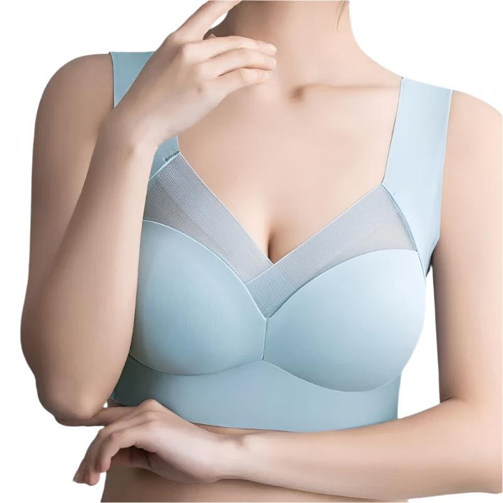 Beżowy bezszwowy biustonosz, wygodny, dopasowujący się do sylwetki, idealny pod obcisłe ubrania, miękki materiał.