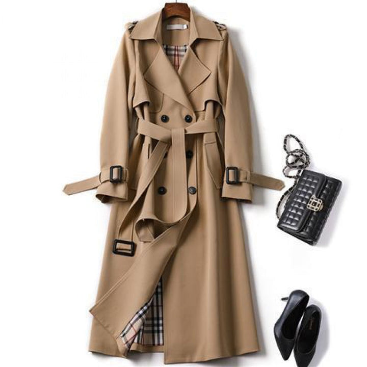 Elegancki damski płaszcz typu trench, lekki, o klasycznym i ponadczasowym kroju, idealny na każdą okazję.