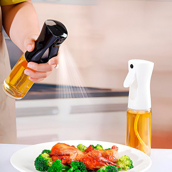 Vaporisateur de cuisine universel élégant et ergonomique en acier inoxydable pour une cuisson précise avec contrôle total.