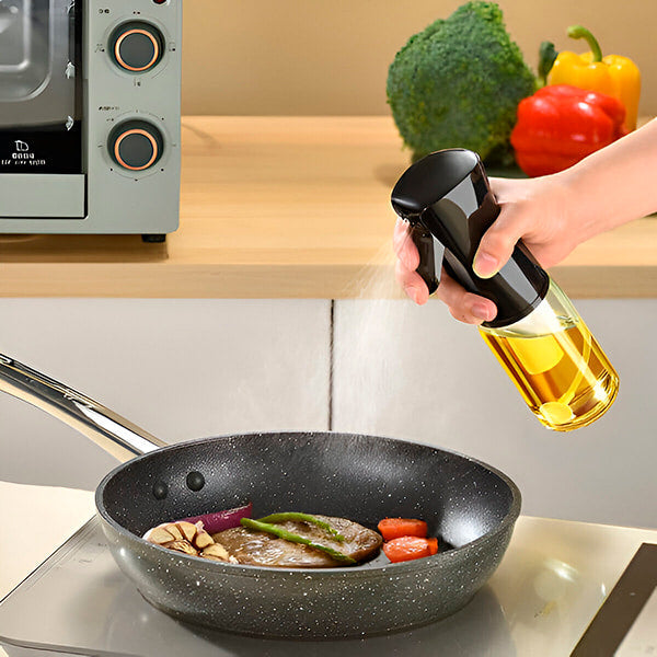 Vaporisateur de cuisine universel élégant et ergonomique en acier inoxydable pour une cuisson précise avec contrôle total.